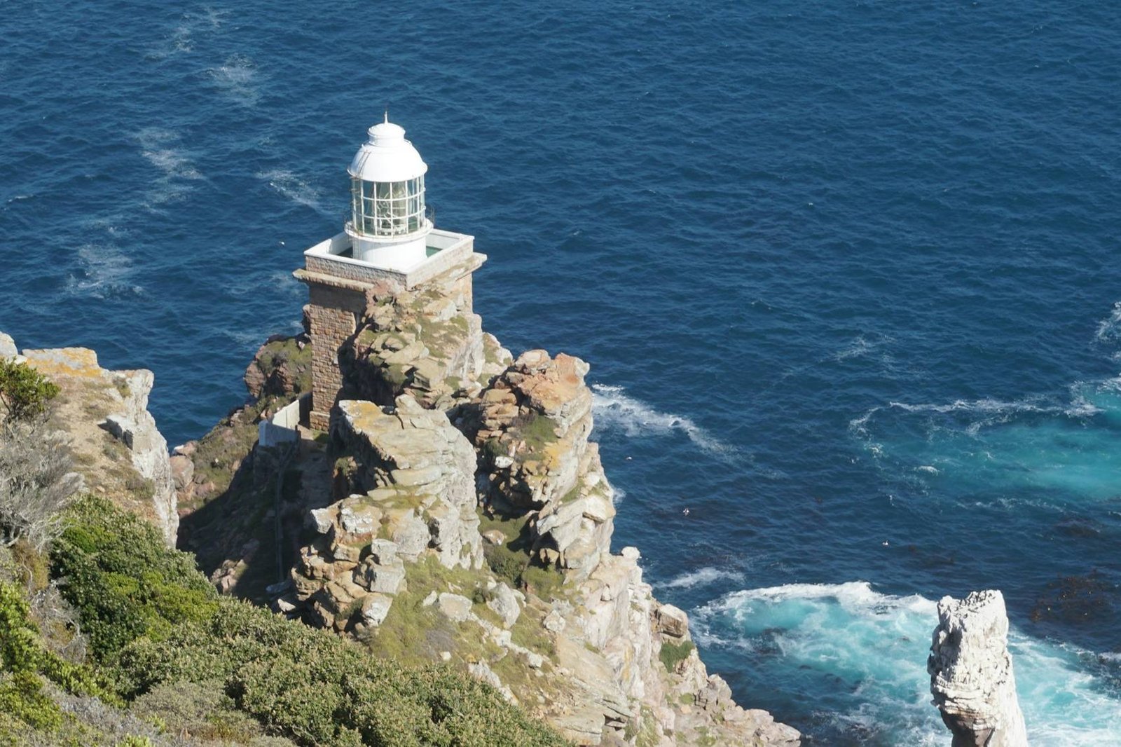 Cape Point lighthouse on the cliffs above the ocean