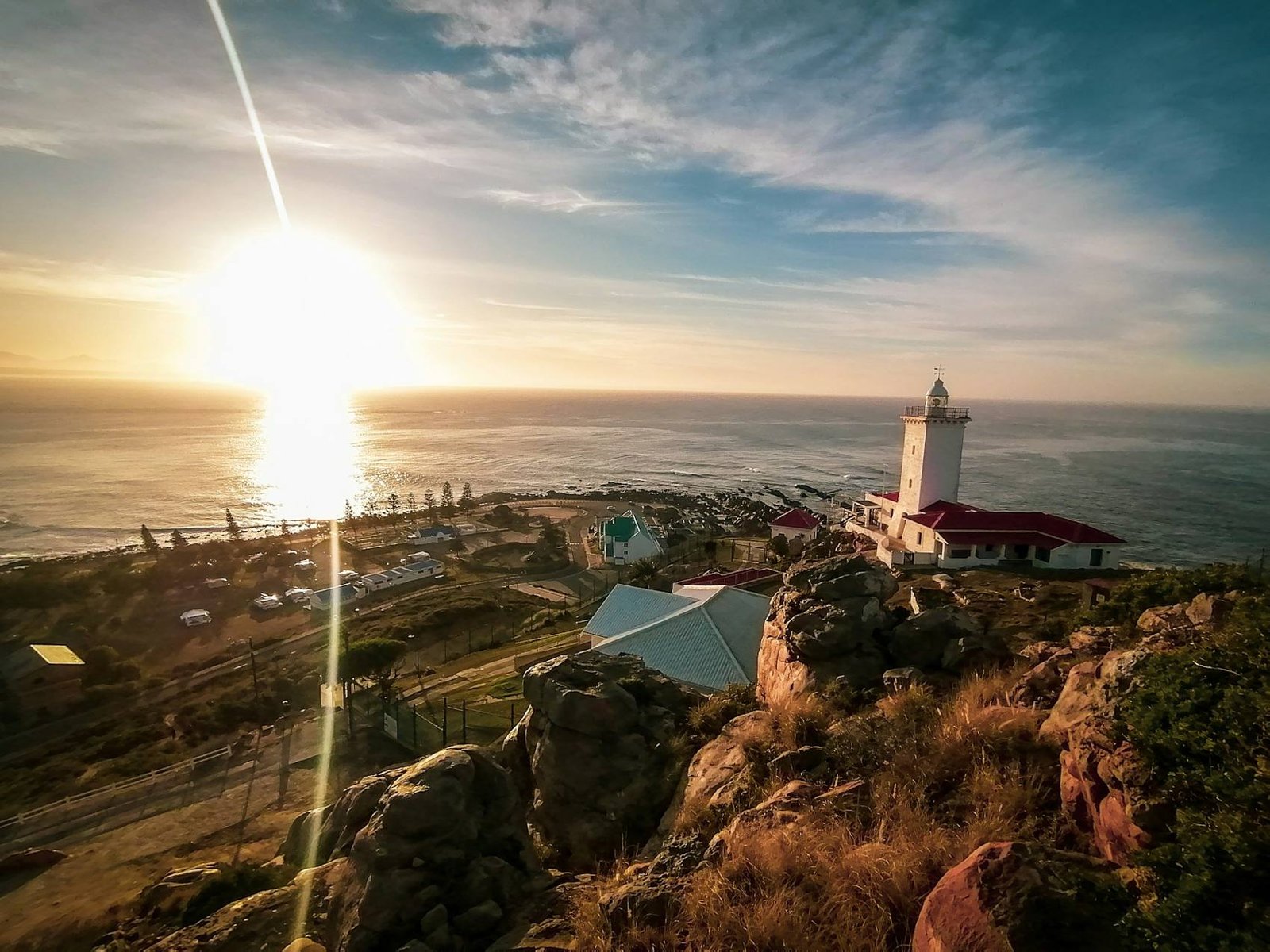 Lighthouse on a cliff above the Indian Ocean
