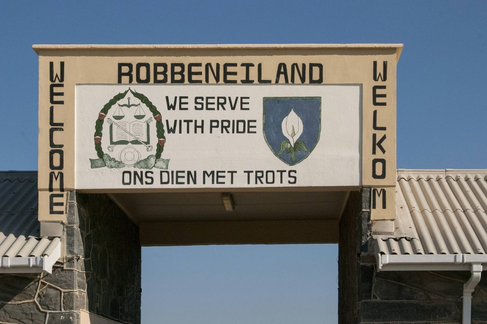 The Robben Island welcome gate, Ons Dien Met Trots